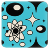 A square coaster with an aqua background featuring black mid‑century atomic shapes. The design includes curved boomerang‑style forms and small cream‑colored open spaces within the shapes.