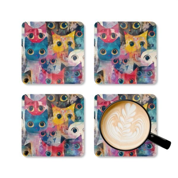 Set of colorful abstract cat‑themed coasters featuring bold brushstrokes and big expressive eyes. Shown with a mug for scale.