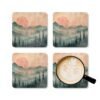 Coaster set featuring misty pines and a warm smokey sunset in soft tones.
