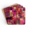 Set of four square coasters with a bright pink geometric design with layered abstract shapes in pink, gold, and white.