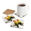 Set of four square coaster with image of a pair of Sun Conure parrots in watercolor style. Shown with mug for scale.